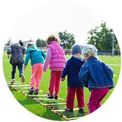 Toddler child care program near me | Building Blocks Kids Playing outdoor preschool